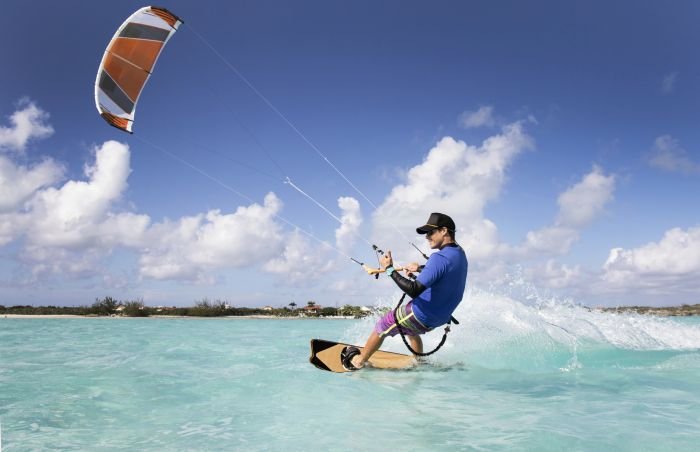man kite surfing